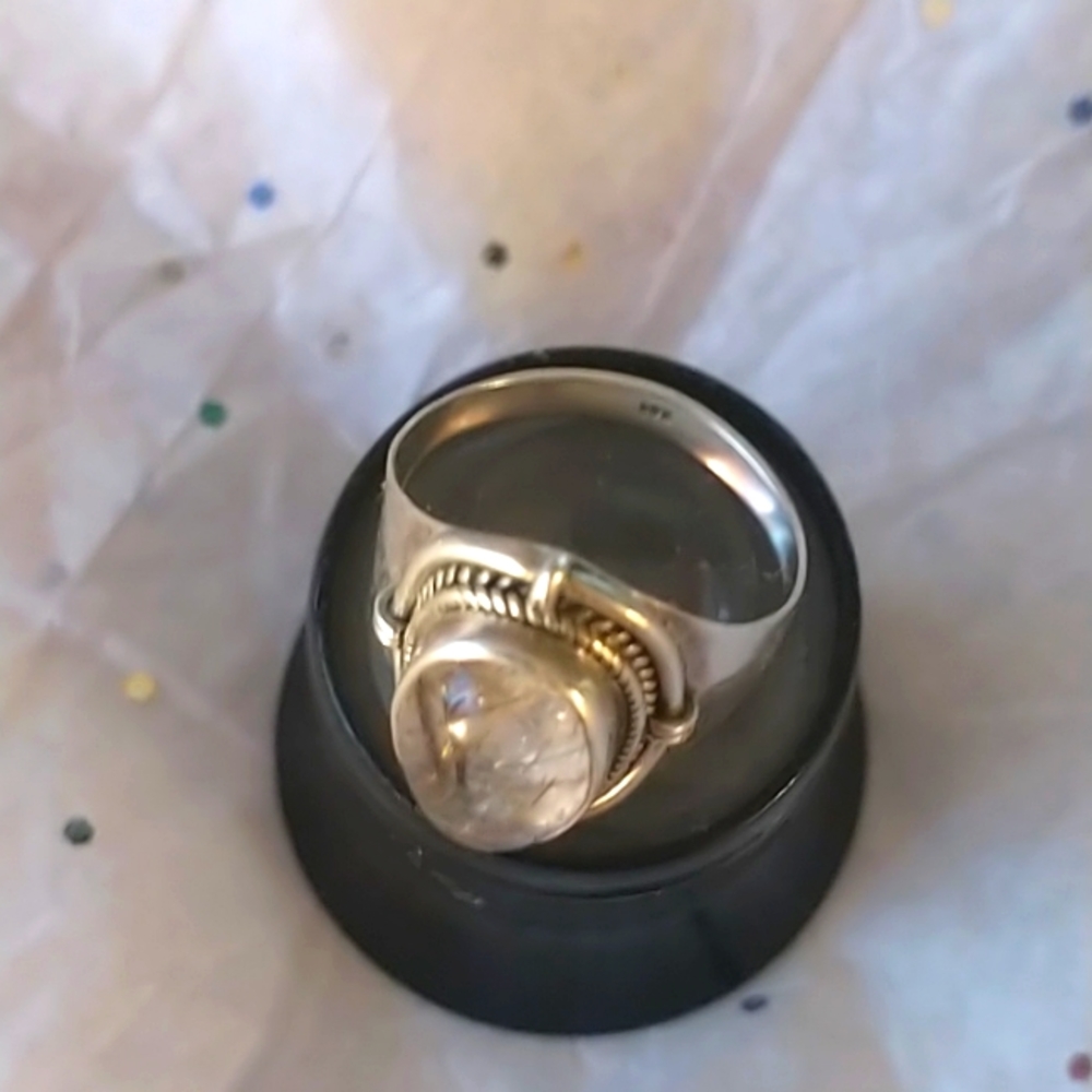 Silver stone has fossil inside, size 7. - Picture 2 of 7